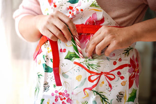 Christmas Gift Set: Poinsettia Apron, Tea Towel, & Greeting Card from Jean Choe Art & Design - Aprons