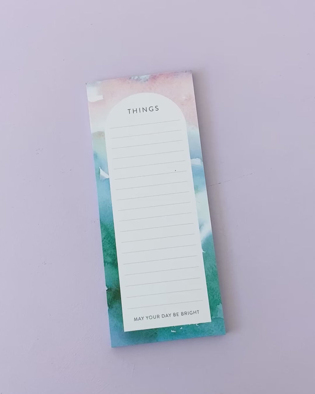 Product video showing notepad of Jean Choe's watercolor wash